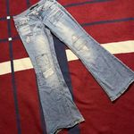 Material Girl  distressed patchwork flare leg jeans
Women’s 1 Photo 0