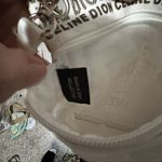 Celine Dion white gold logo writing shoulder bag book bag les vegas vip merch Photo 3