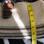 Cute 90s beige cream tan khaki crochet bag with a brown green pink stripes shoulder hand bag purse and buckle detail. Photo 6