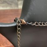 Multi Layered Necklace With Brass, Copper, and Gold Color Hammered Plates Photo 3