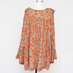 Free People . Loretta Floral Oversized Top. Photo 1