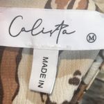 Size medium women’s long sleeve brown floral dress Photo 4