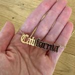 California Spelling Necklace in Gold Photo 0