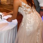 Allure Bridal Size 6  Worn once for wedding day one year ago! Been in storage in dress bag for the past year. Non smoking home.  Purchased from Bliss Bridal for $1,800   Asking price negotiable !! OBO!  Photo 2