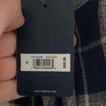 Lucky Brand NWT  plaid shirt size small. 
Shirt tails in the back. See pics! Photo 5