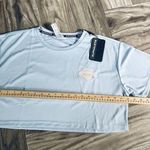 Alphalete  Women’s Varsity Crop - Light Blue Size Medium Photo 4