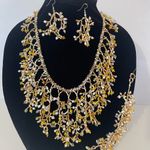 Necklace,earrings & bracelet Elegant Gold,yellow, white (multicolor) Jewelry Set Gold Photo 0