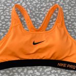 Nike Pro Orange and Black Sports Bra Photo 0