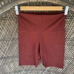 Nike yoga lux shorts rust color size x small Photo 0