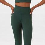 Girlfriend Collective  High-Rise Compression 7/8 Leggings In Moss Green Photo 0