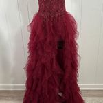 Prom Bay size 6 prom dress in the color wine. Corset with Lace up back & Ruffles Red Photo 0