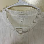 Chic White Ruffled Button Photo 2