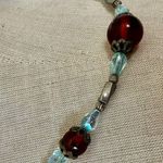 Vintage glass bead necklace with orange and aqua blue tones Photo 1