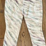 Athleta Women’s  leggings - size Large - white w/ swooshes of gray, pink, purple Photo 0