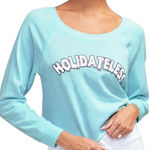 Wildfox NWT Holidateless World Tour Crop No plus one? Show up unapologetically solo. The World Tour is a raw-cut, cropped sweatshirt with raglan sleeves and banded hems at the wrist. Details French Terry; 50% Cotton / 50% Polyester Photo 3