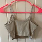 Cropped workout top with built in bra sz Sm Tan Photo 1