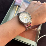 Michael Kors  silver and gold watch with little diamonds inside Photo 0