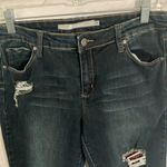 Tractr: Stretchy Skinny Jeans with red flannel covered holes Photo 7