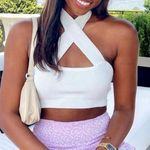 Tic Toc White Twist halter crop in a ribbed sweater material Photo 1