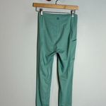 Marmot  teal side pocket athletic leggings Photo 4