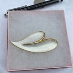 Vintage J.J. Brooch Modernist white enamel on gold colored metal. Photo 1