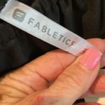 Fabletics  black romper cut outs on leg off shoulder or on Photo 3