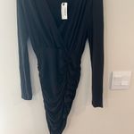 EXPRESS NWT X Olivia culpo Black bodycon dress with shoulder pads xs Photo 5