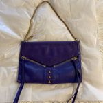 Botkier  Purple Handbag very good condition lots of zippers and pockets see photo Photo 0