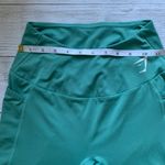 Gymshark Sage Green Leggings with Pockets and Mesh Side Panels in Size S Photo 3