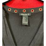 Forever 21  black dress with brass embellishments, pockets in the front size S Photo 2