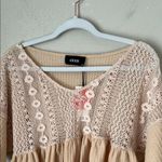 Cider  Size M HOLLOW OUT RUFFLE HEM SHORT SLEEVE SHEER CROCHET TOP in Burlywood Photo 2