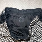 Nike Women's Black and White Checkered Athletic Shorts Photo 4