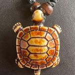 Adjustable black rope turtle necklace Photo 0