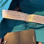 SYROKAN Women's Zip Front High Impact Wireless Racerback Sports Bra Photo 3