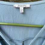 JODIFL NWT  size L faux wrap deep V blouson bell sleeves top. Photo 2