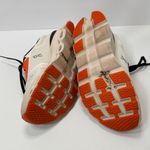on cloud On Running Athletic Shoes White and Orange Photo 5