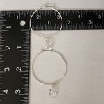 Silver Hoop Earrings with Floating Cubic Zirconia Diamond Photo 6
