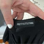 Pretty Little Thing  black v neck bodysuit size 4 Photo 1