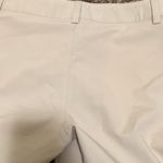 Under Armour  loose fit woman golf style shorts size 6 khaki color Photo 9