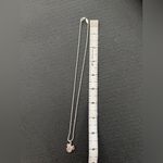 Elegant Silver Necklace with Rose Gold Accents Photo 3
