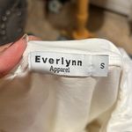 Everlane ruffled sleeve with pearl and gem neckline. Photo 6