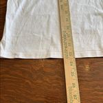 Pact women’s long sleeve front pocket Tee. White size extra large. Photo 5