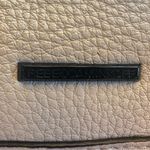 Rebecca Minkoff Cream Pebbled Leather Backpack with Lace Up and Tassel Detail Photo 9