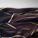 Nike  Women's‎ Icon Clash Fast Dri-Fit Black and Gold Leggings Size Small | EUC Photo 6