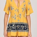 Trixxi Clothing Company Yellow Floral Print V Neck Tie Back Romper Size M Size M Photo 0