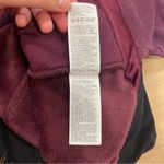 Athleta Cozy Karma twist neck sweatshirt. Deep Burgundy Color sz small Photo 11