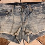 American Eagle  acid light wash studded denim booty shorts size 4 Photo 2