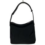 Cole Haan  collaborate with Estee’ Lauder shoulder bag. Photo 1