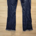 {29} KanCan Distressed Blue Jean Split Flare Hem Fringe Detail Photo 8