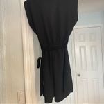 Emma & Michele  Black Sleeveless romper tie waist size large shoulder padding Photo 3